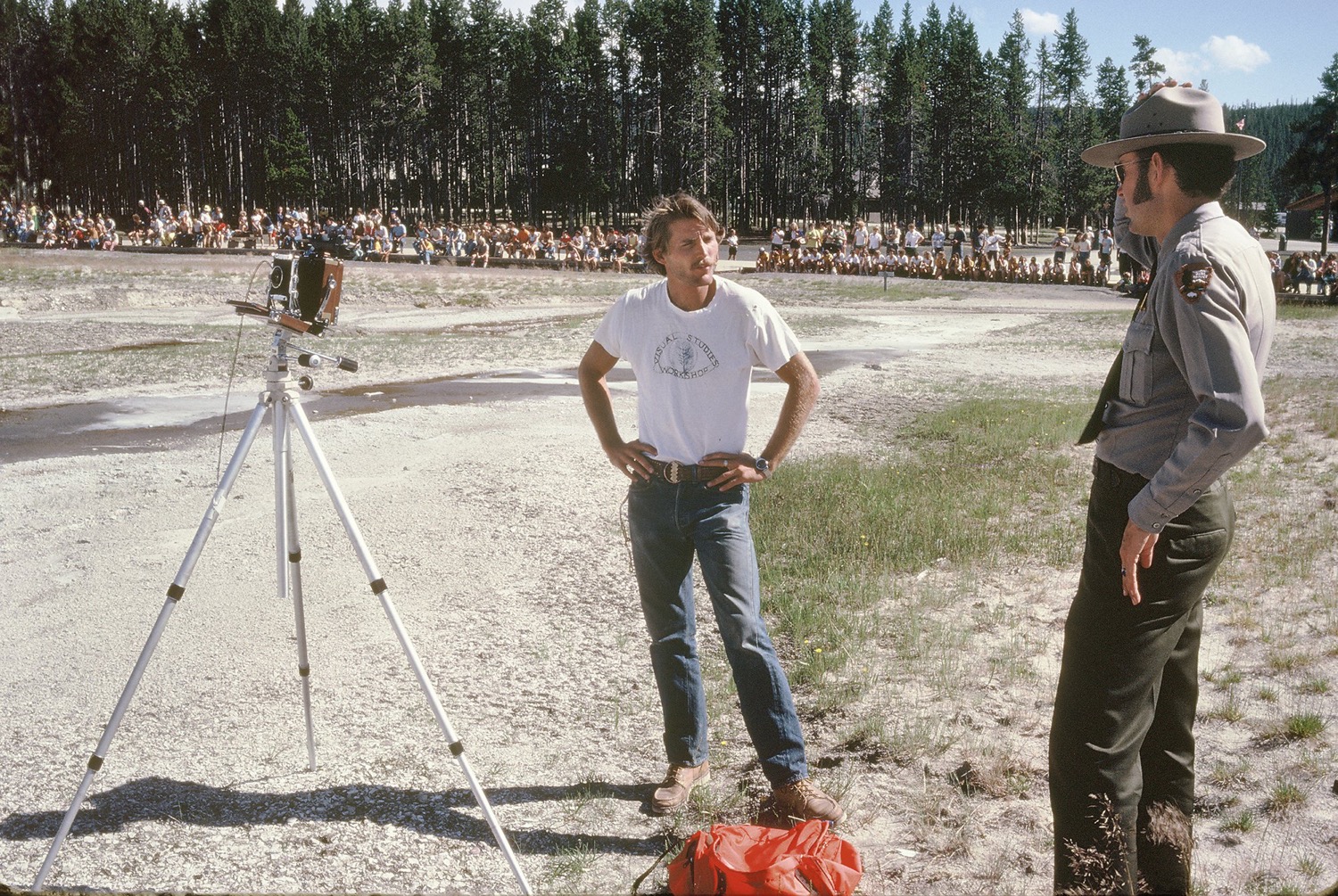 Mark and ranger with 3000 people waiting for Old Faithful to erupt, Yellowstone, Wyoming, 1978.