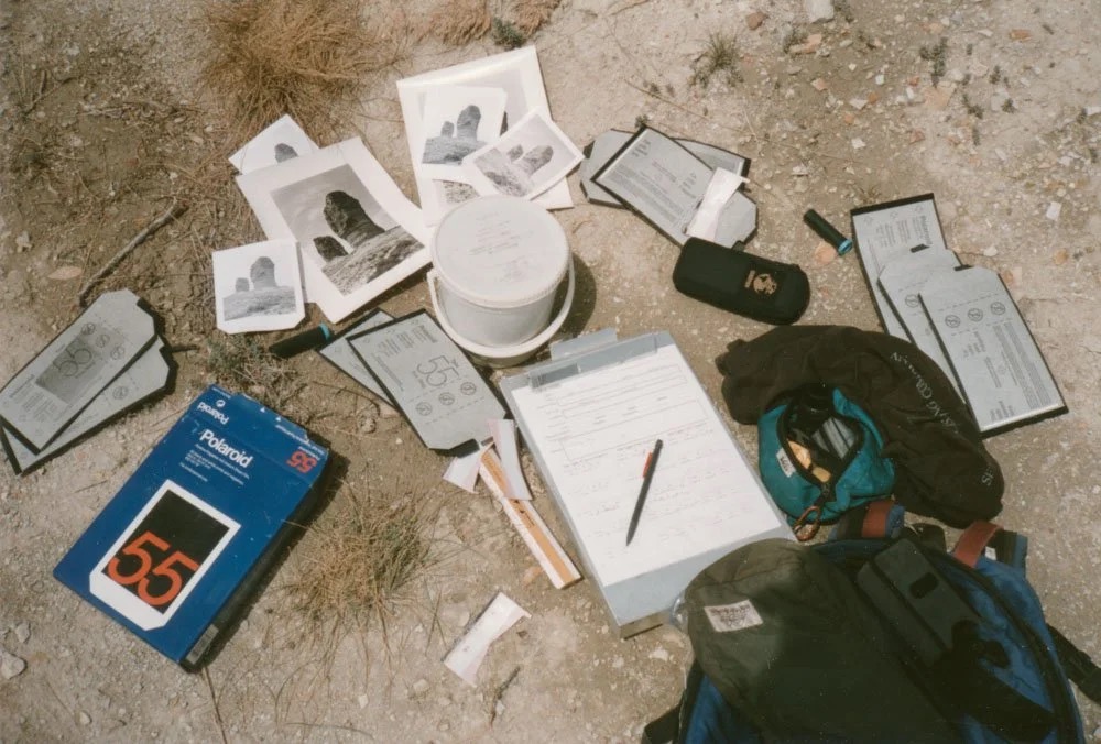 Polaroid film and bucket for clearing negatives, Green River, Wyoming 1997