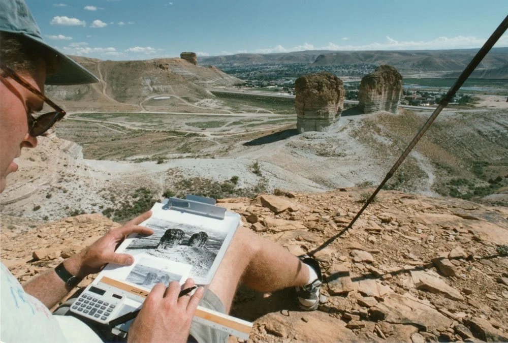 Byron checking the measurements for repeating O’Sullivan’s view of “Teapot Rock and the Sugar bowl” Green River, Wyoming 1998